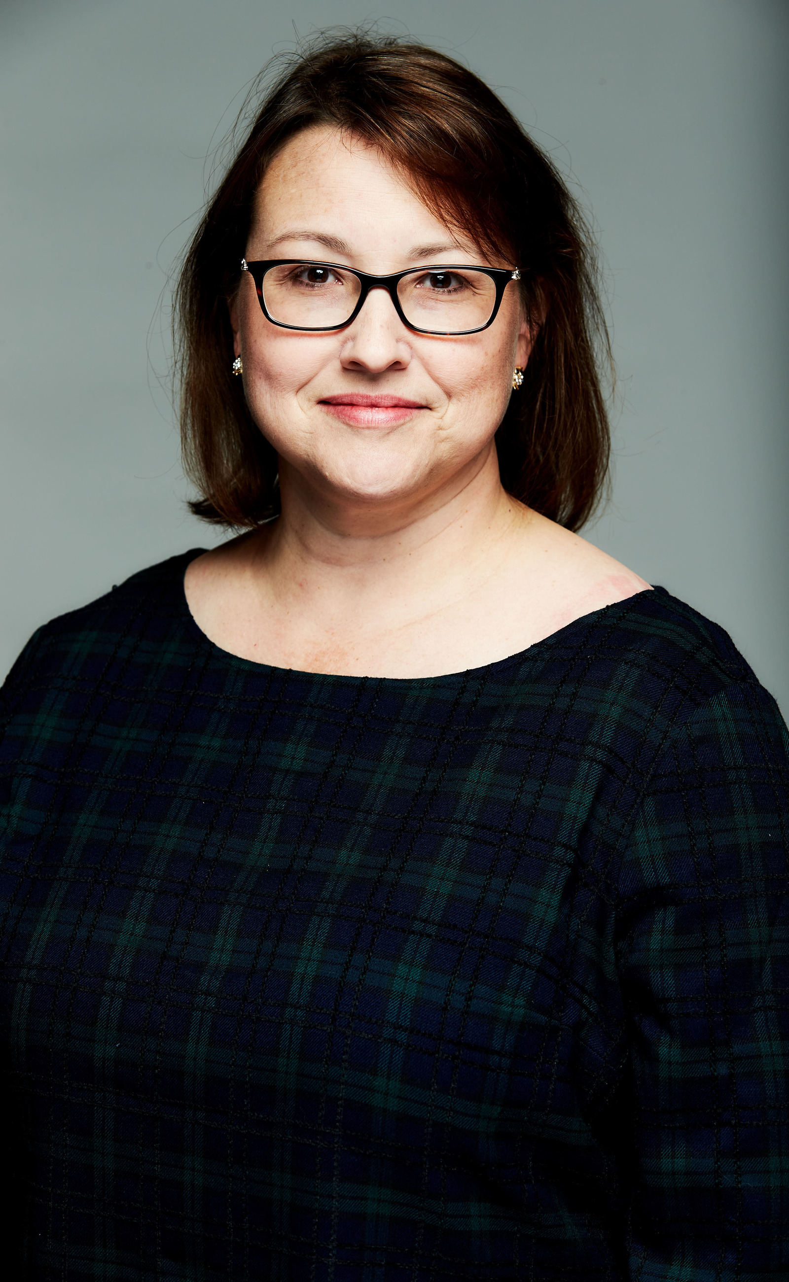 image of a woman wearing glasses with short shoulder length hair